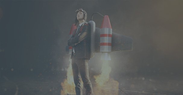 A young man with a jetpack on his back with rockets attached that have been ignited